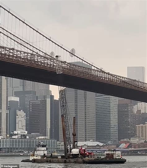 crane on barge hits brooklyn bridge